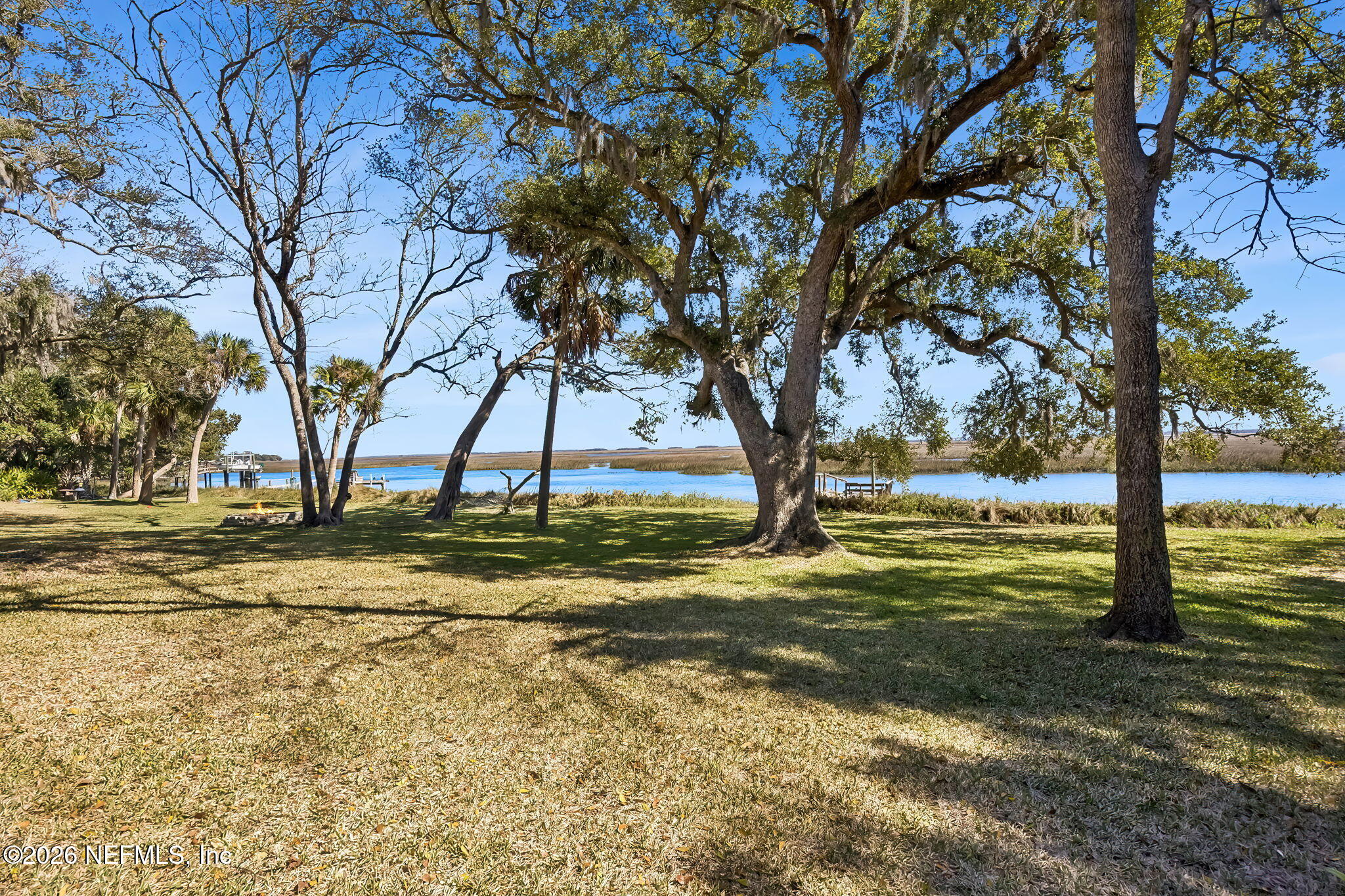 97146 Pirates Point Road Yulee, FL 32097 - Photo 48 of 74 a view of an ocean with a tree
