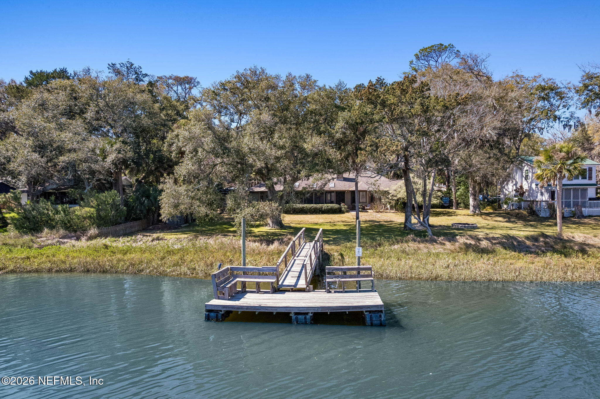 97146 Pirates Point Road Yulee, FL 32097 - Photo 54 of 74 a view of a lake with trees