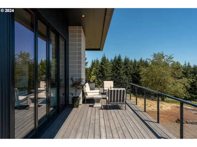 a view of balcony with furniture