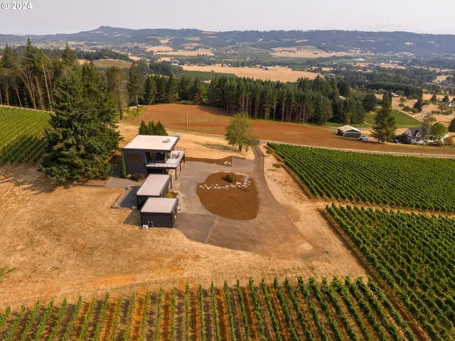 a view of a house with a outdoor space and balcony