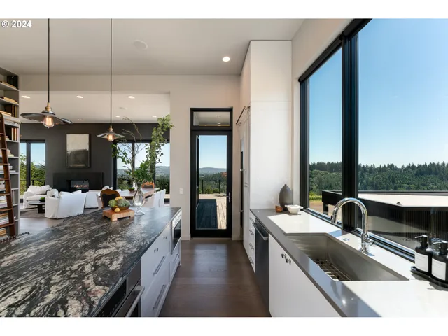 a view of balcony with couch and wooden floor