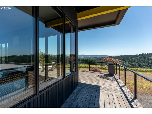 a view of balcony with furniture