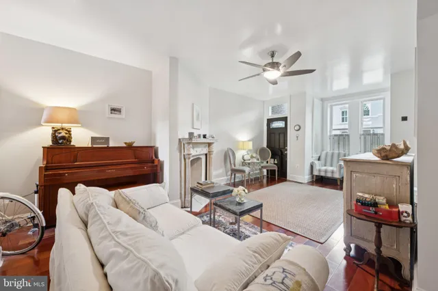 a bedroom with furniture and a chandelier