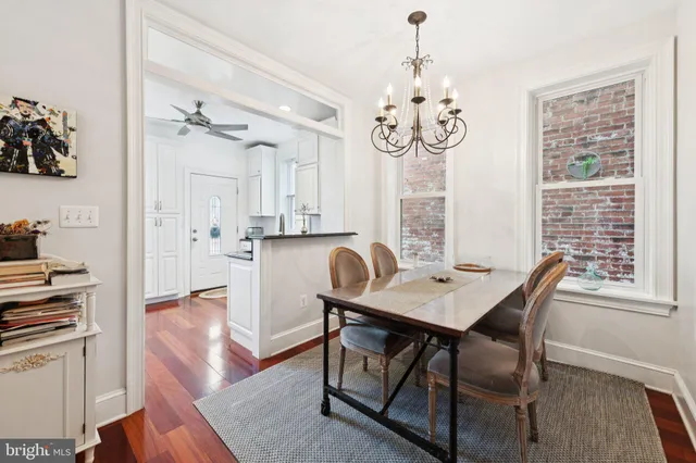 a view of a hallway with washer and dryer