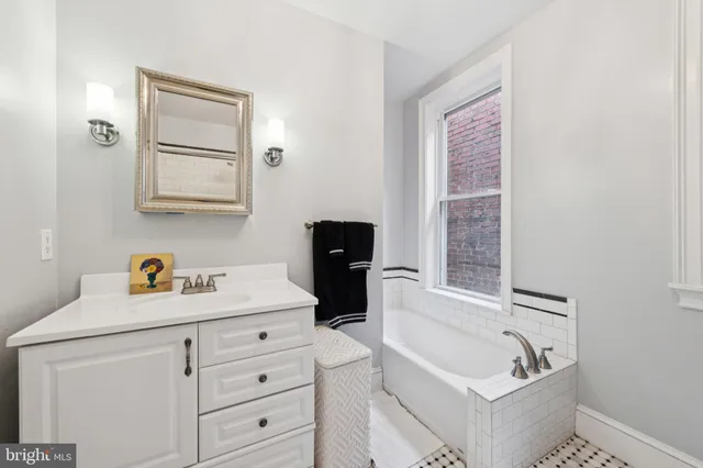 a bathroom with a toilet a sink and a shower