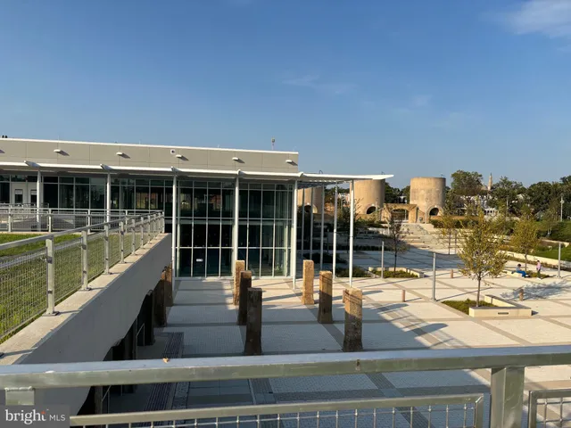 a view of a swimming pool with a lounge chairs
