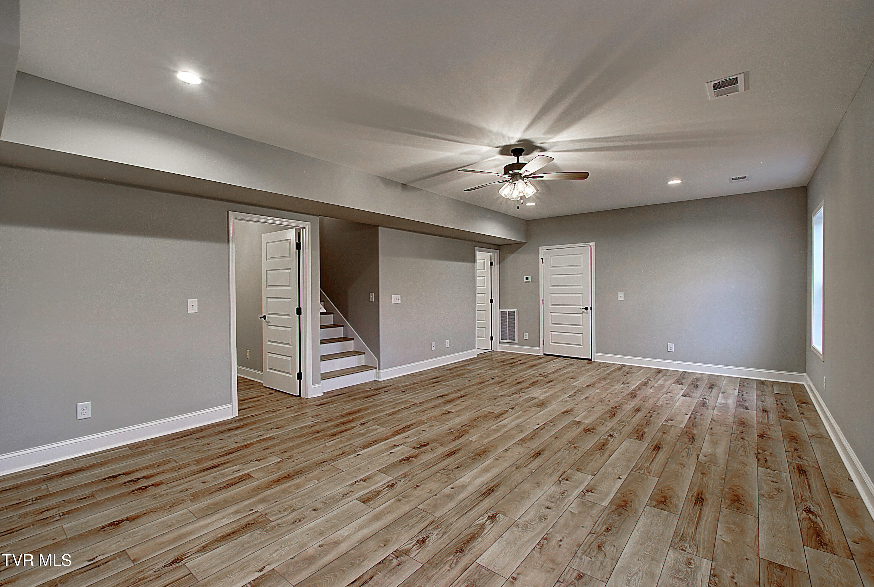 2442 Haystack Circle Piney Flats, TN 37686 - Photo 20 of 29 basement living area