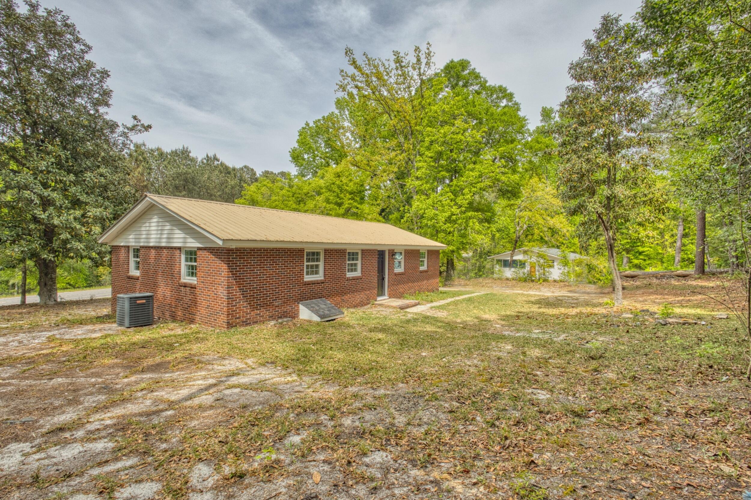 3016 Wagener Road Aiken, SC 29801 - Photo 28 of 29 a view of a house with a yard