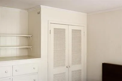 a view of a closet in a room