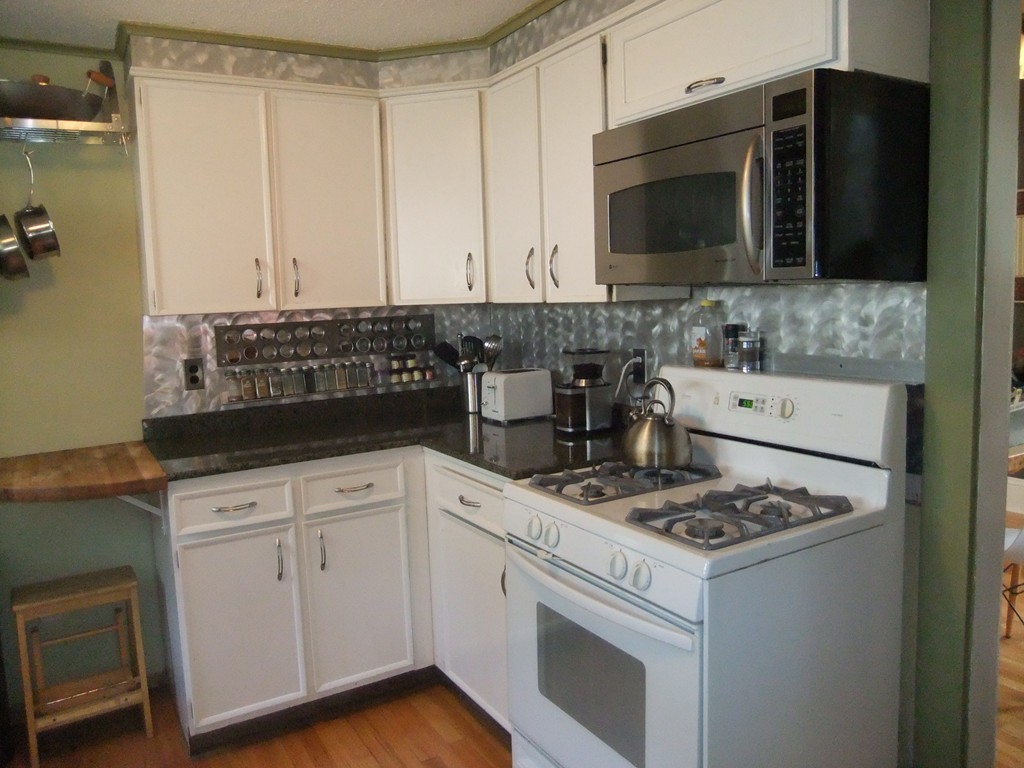 53 Newhall Street Springfield, MA 01109 - Photo 11 of 29 a kitchen with appliances a sink and cabinets
