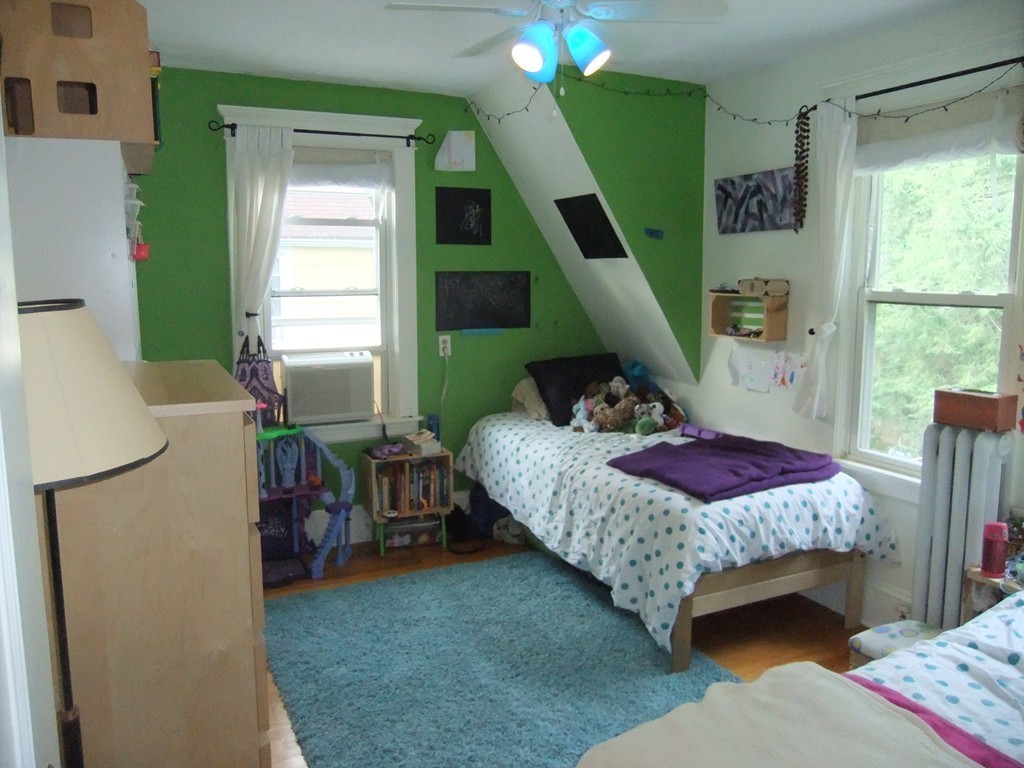 53 Newhall Street Springfield, MA 01109 - Photo 21 of 29 a bedroom with a bed and a window
