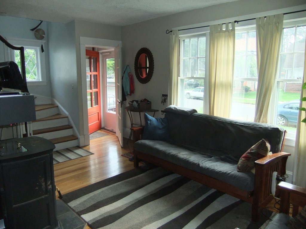 53 Newhall Street Springfield, MA 01109 - Photo 5 of 29 a living room with furniture and a large window