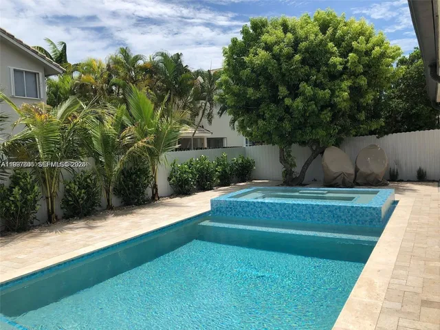 a view of a garden with a bench