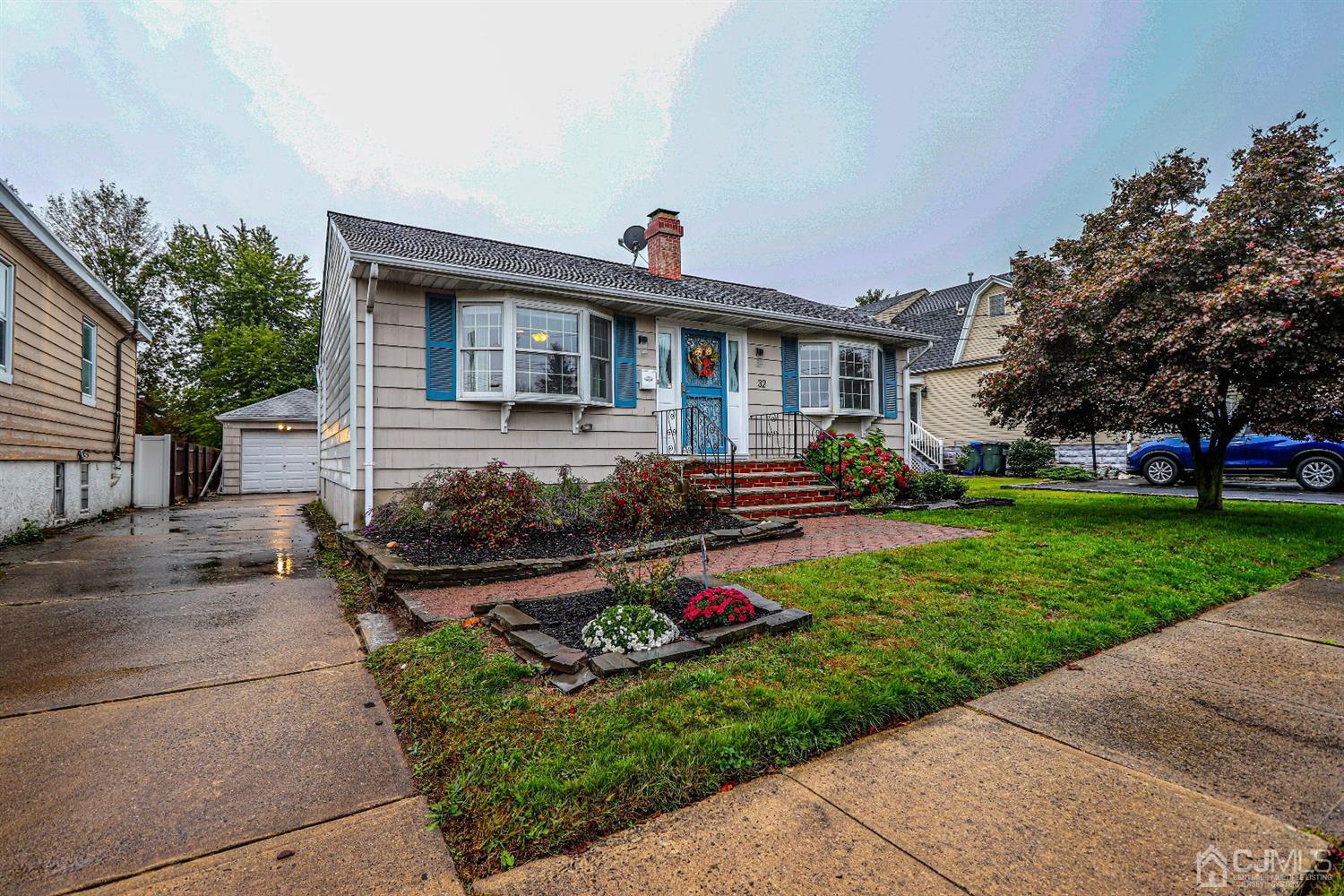 32 Rector Avenue Woodbridge, NJ 07095 - Photo 1 of 29 a front view of house with yard and green space