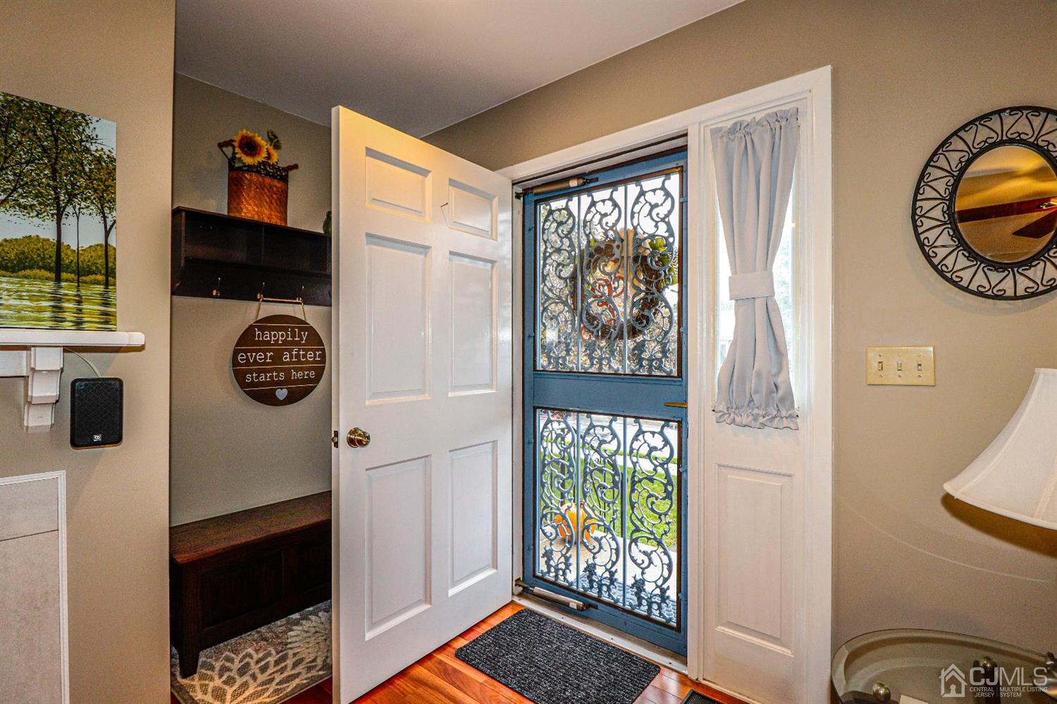 32 Rector Avenue Woodbridge, NJ 07095 - Photo 3 of 29 a view of entryway with a flower pot and a window