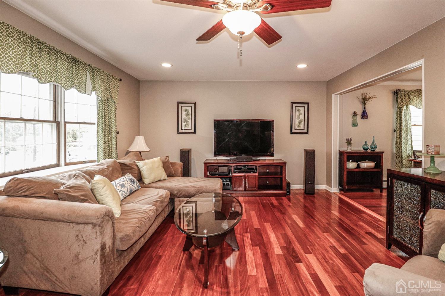 32 Rector Avenue Woodbridge, NJ 07095 - Photo 5 of 29 a living room with furniture and a flat screen tv