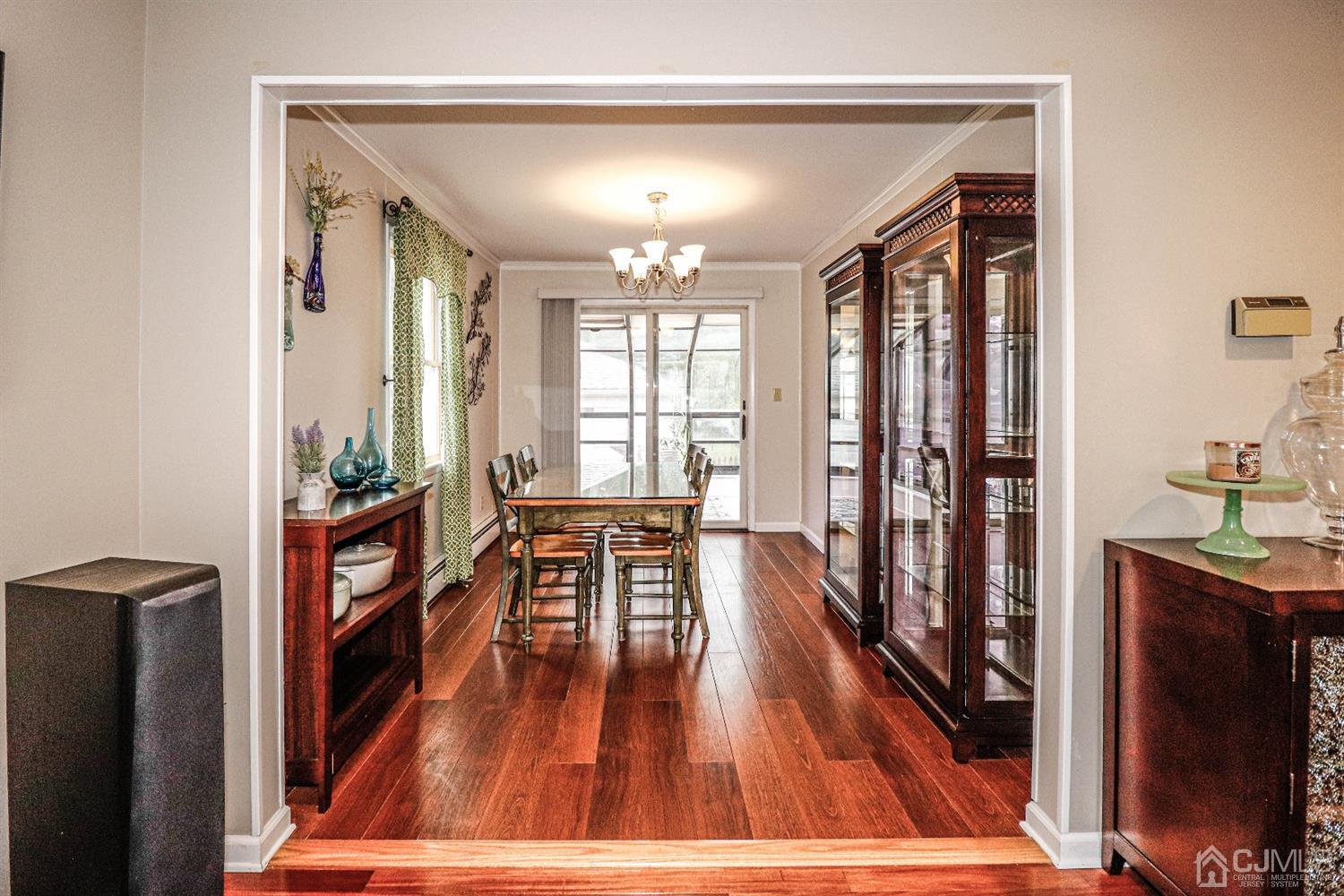 32 Rector Avenue Woodbridge, NJ 07095 - Photo 7 of 29 a view of a hallway with wooden floor and furniture