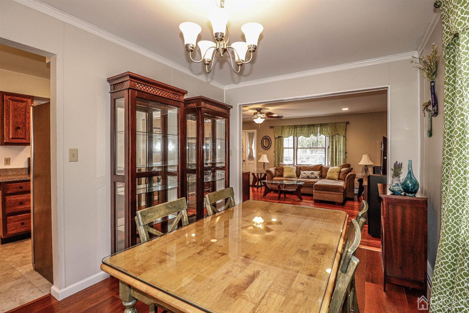 32 Rector Avenue Woodbridge, NJ 07095 - Photo 8 of 29 a view of a dining room with furniture window and wooden floor