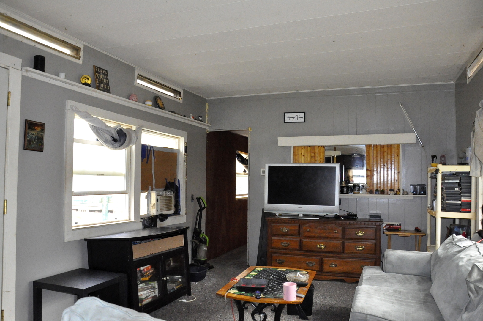 3350 East 2059th Road Ottawa, IL 61350 - Photo 18 of 23 a living room with furniture and a flat screen tv