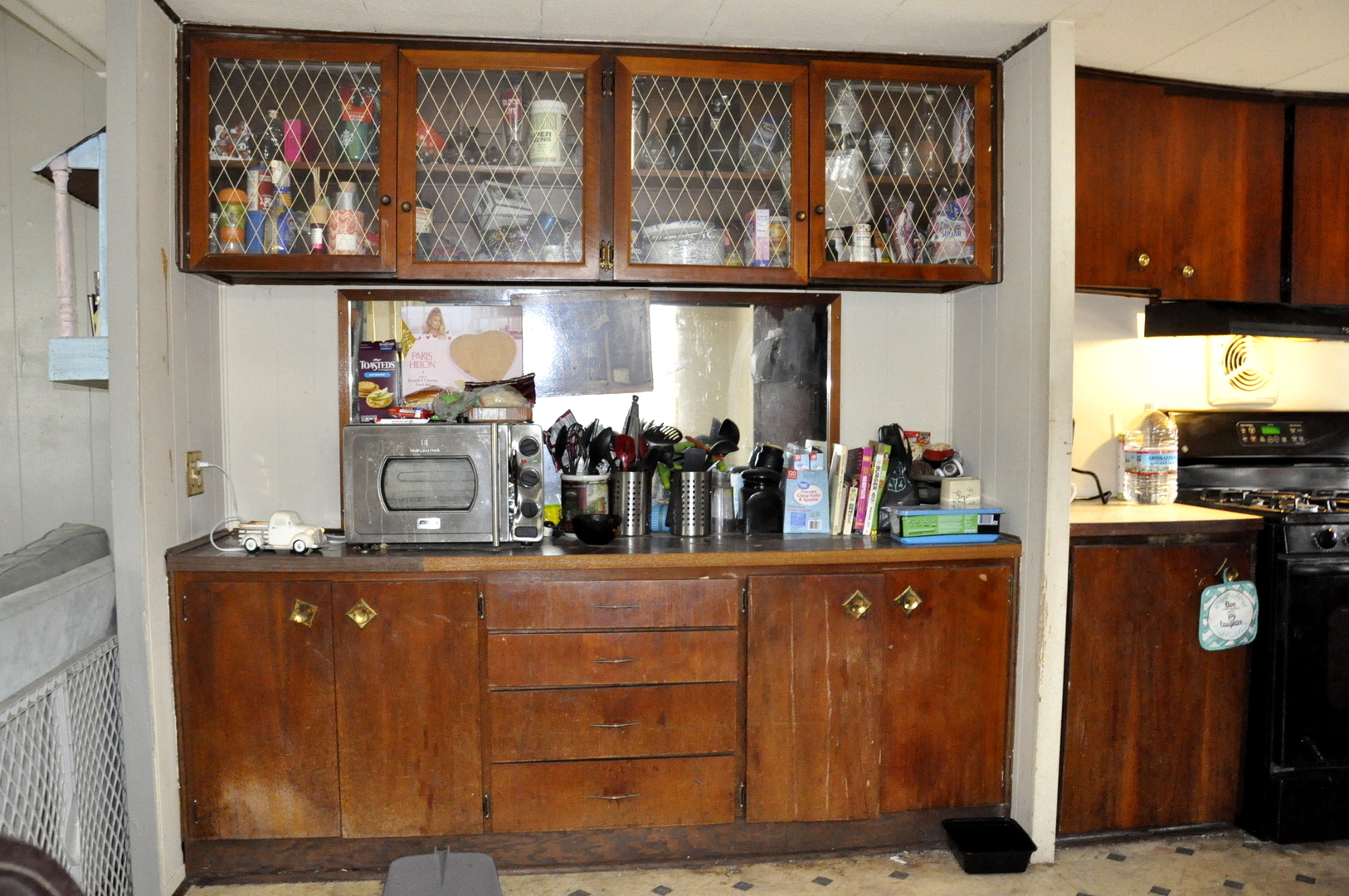 3350 East 2059th Road Ottawa, IL 61350 - Photo 19 of 23 a kitchen with wooden cabinets and a window