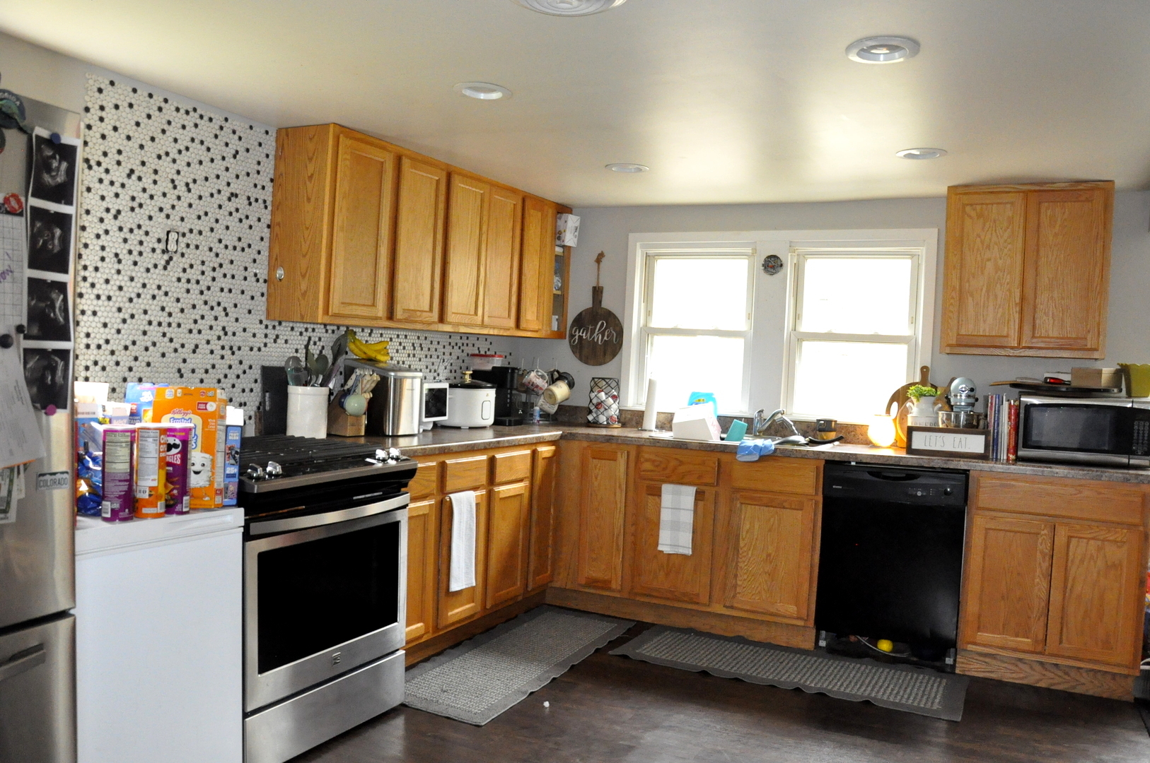 3350 East 2059th Road Ottawa, IL 61350 - Photo 5 of 23 a kitchen with a sink stove top oven and cabinets