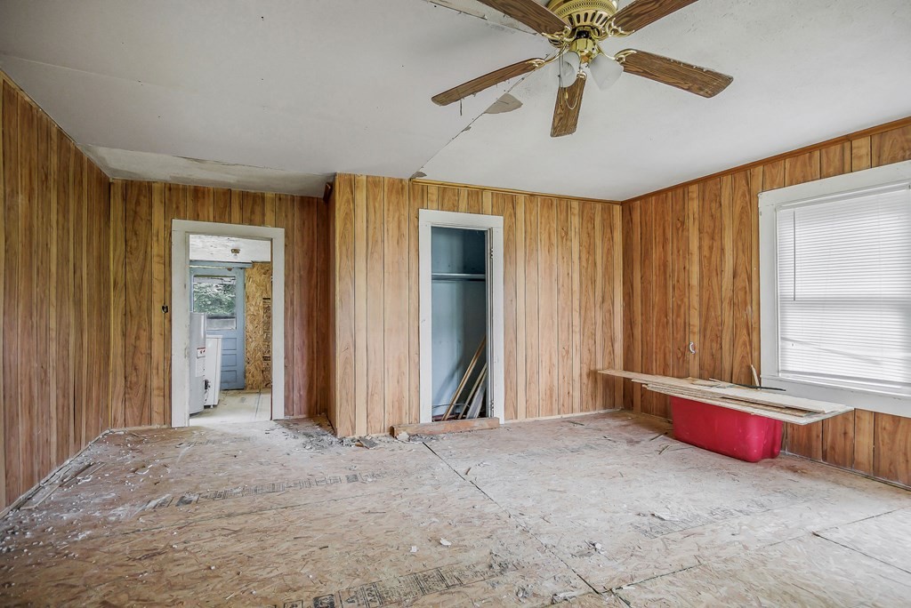 147 Mayberry Street Sparta, TN 38583 - Photo 11 of 22 an empty room with fan and windows