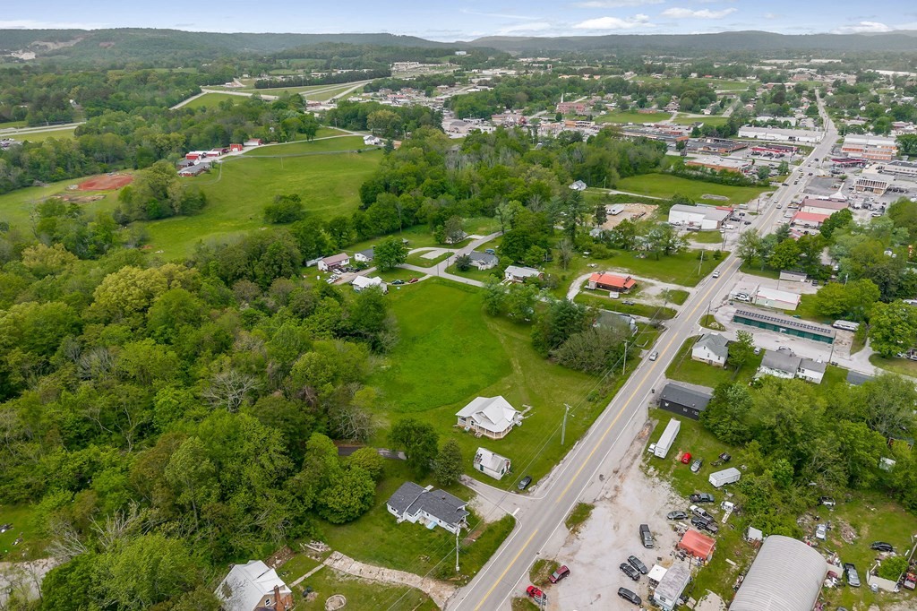 147 Mayberry Street Sparta, TN 38583 - Photo 19 of 22 an aerial view of residential houses with outdoor space and mountain view