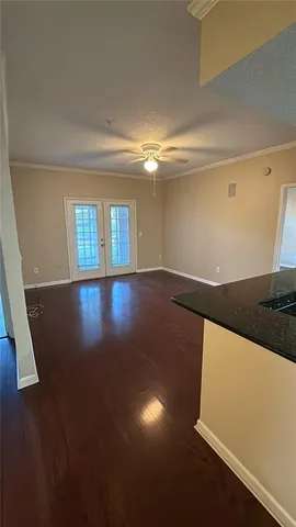 a view of an empty room and window