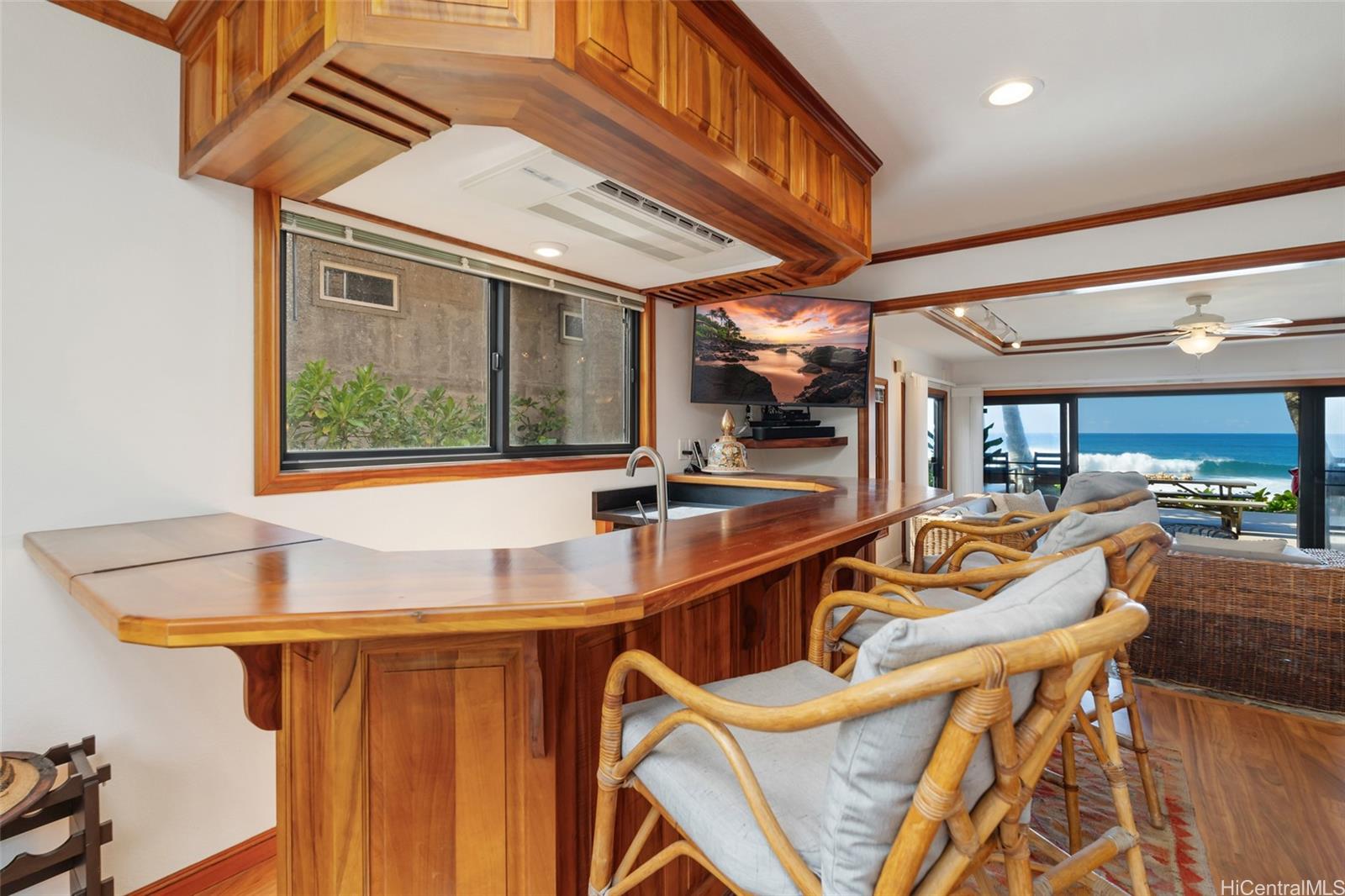 59-377 Ke Nui Road Haleiwa, HI 96712 - Photo 6 of 25 a view of a patio with a table and chairs