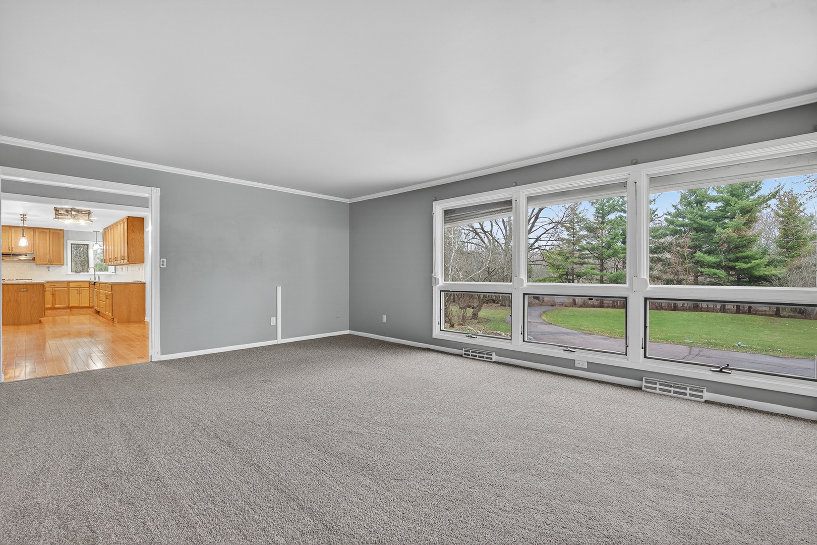 38-w042 Silver Glen Road St. Charles, IL 60175 - Photo 13 of 40 a view of an empty room with a large window