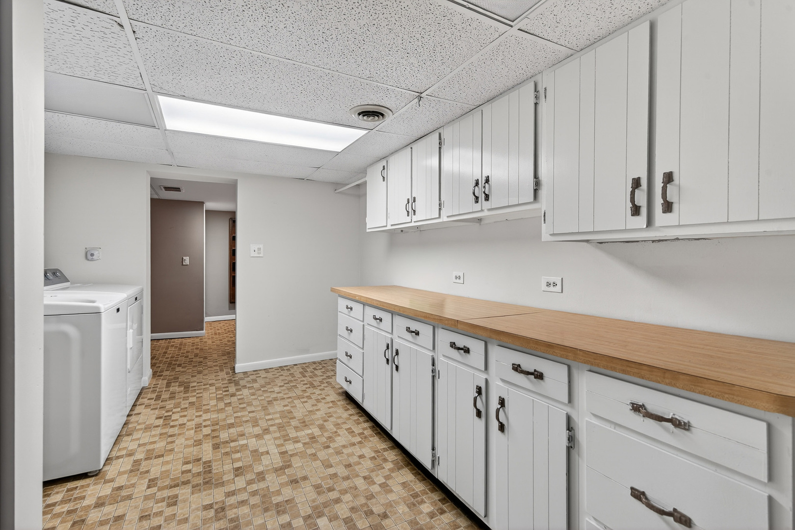 38-w042 Silver Glen Road St. Charles, IL 60175 - Photo 28 of 40 a kitchen with granite countertop white cabinets and stainless steel appliances