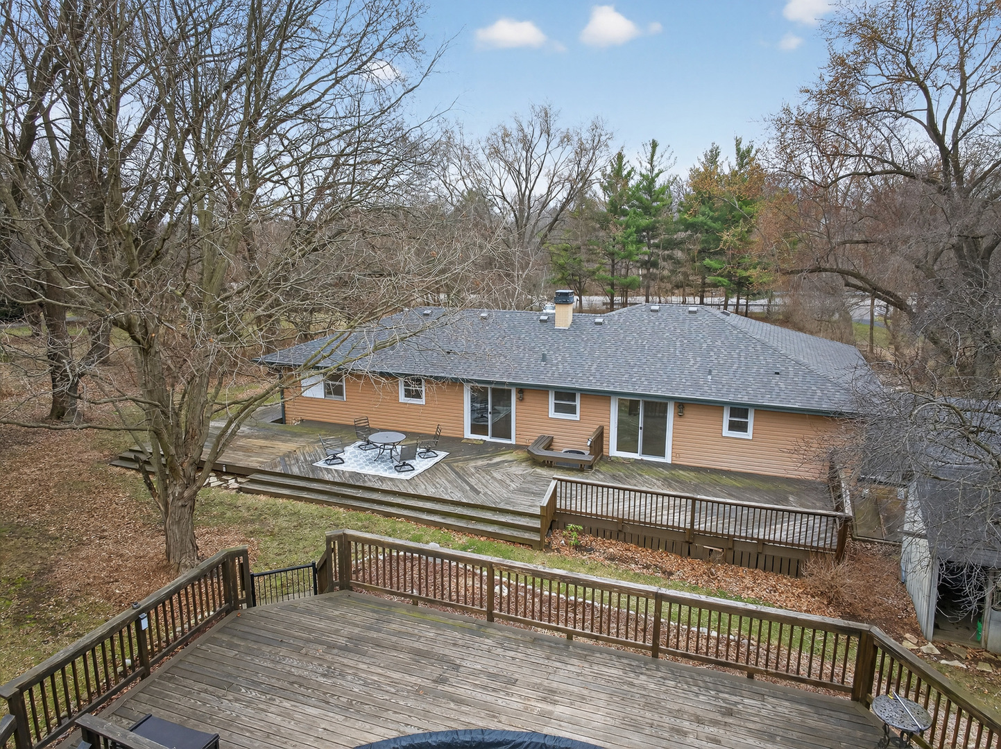 38-w042 Silver Glen Road St. Charles, IL 60175 - Photo 35 of 40 front view of a house with a bench