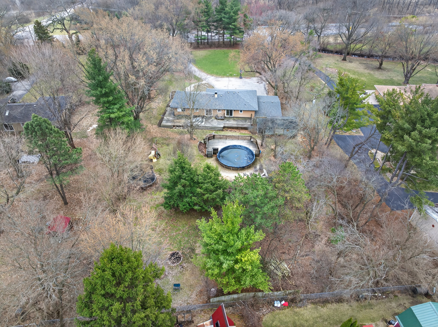 38-w042 Silver Glen Road St. Charles, IL 60175 - Photo 37 of 40 a aerial view of a house with yard swimming pool and outdoor seating