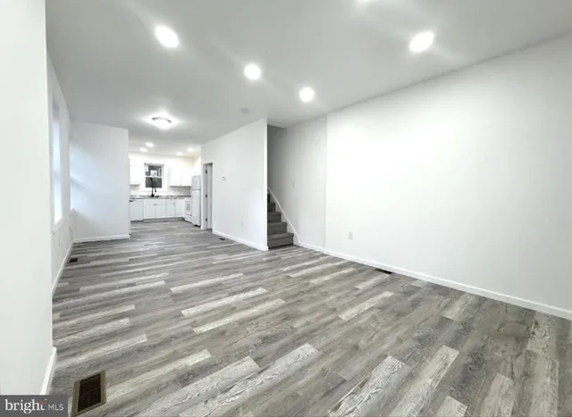 an empty room with windows