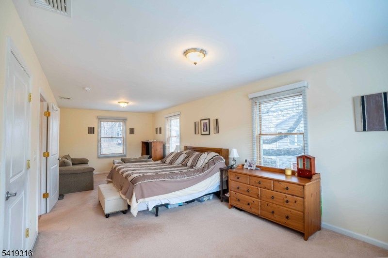 2 Lilac Road Lake Hopatcong, NJ 07849 - Photo 16 of 34 a bedroom with a bed and window