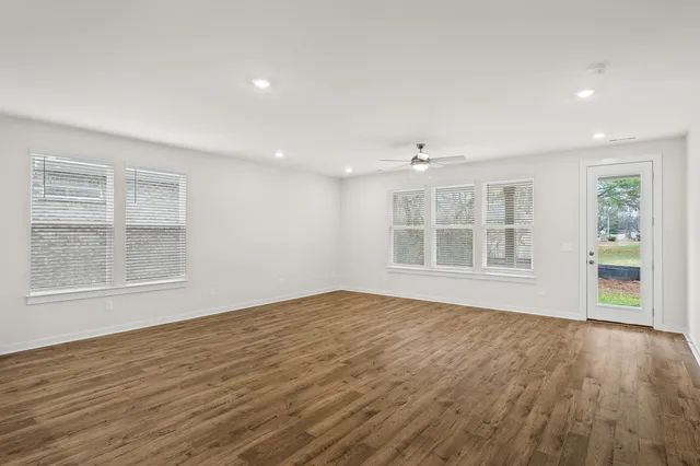a living room with furniture fireplace and a flat screen tv