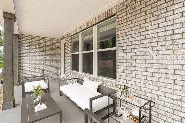 a view of a porch with a yard