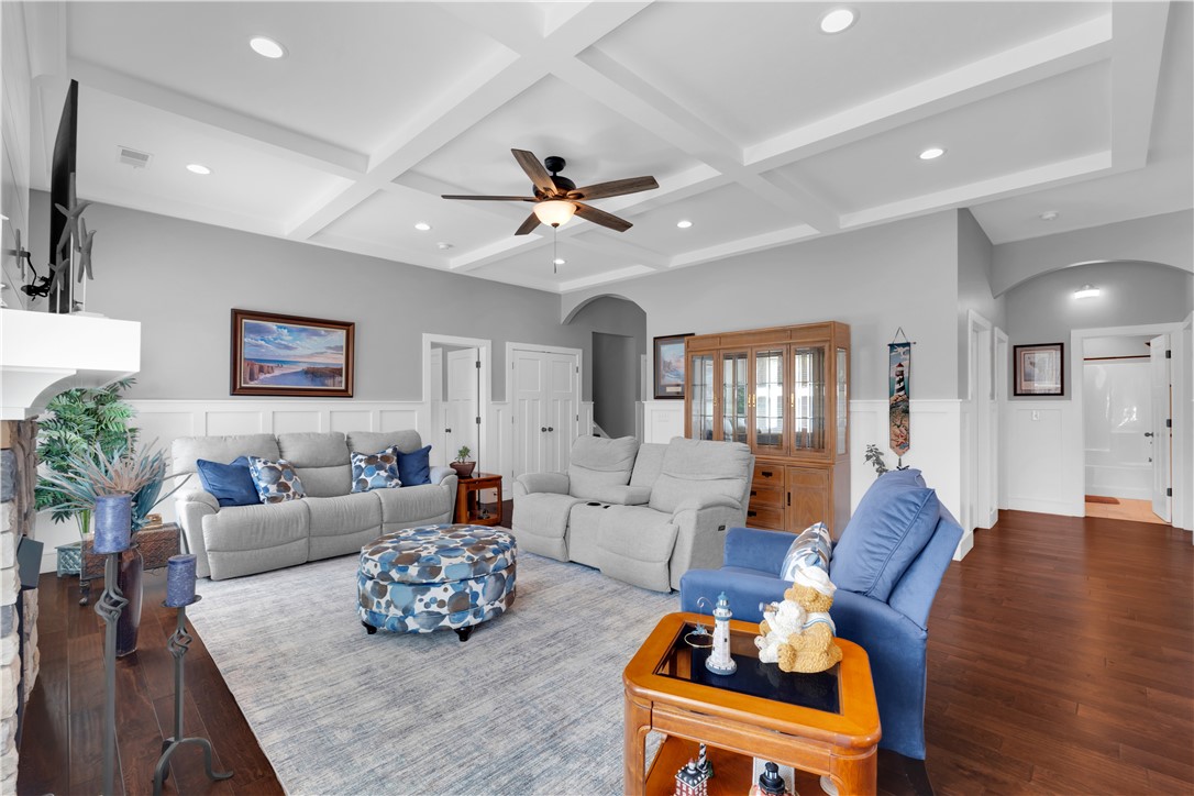 181 Amberwood Drive Anderson, SC 29621 - Photo 7 of 28 This inviting living space features elegant coffered ceilings and rich hardwood flooring throughout.