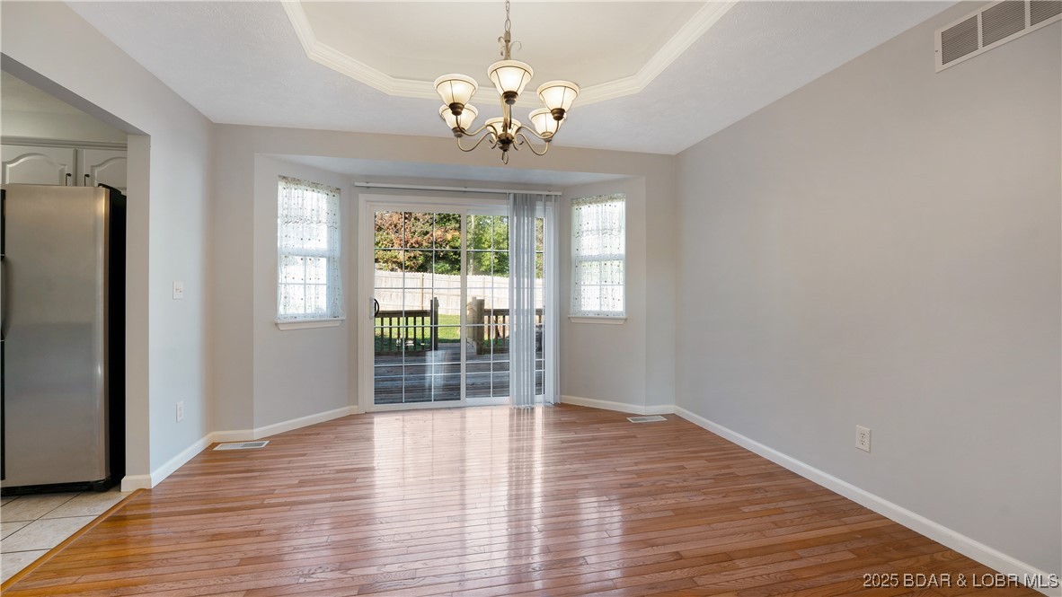 94 Shadow Oaks Road Camdenton, MO 65020 - Photo 8 of 39 Dining room open to the kitchen & living room