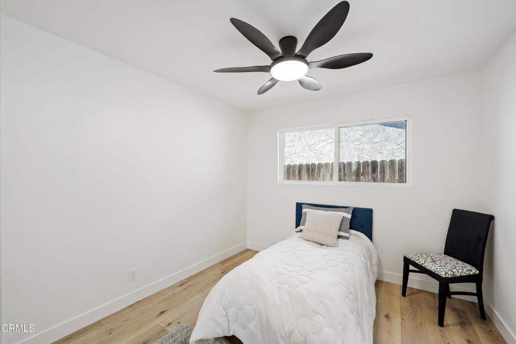 930 Topsail Court Oxnard, CA 93035 - Photo 31 of 31 a bedroom with a bed and a window