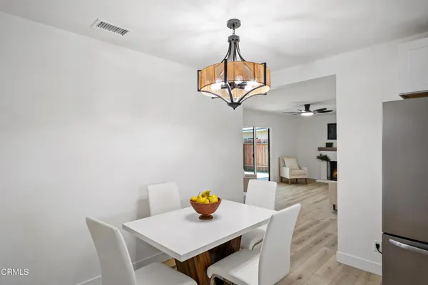 a view of a dining room with furniture