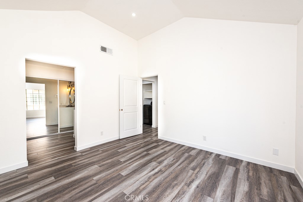 4240 Lost Hills Road, Unit 3108 Calabasas, CA 91301 - Photo 16 of 28 a view of an empty room and wooden floor