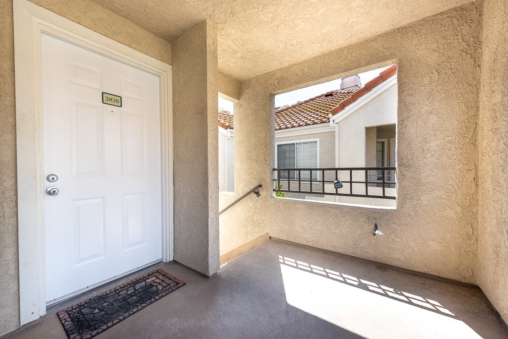 4240 Lost Hills Road, Unit 3108 Calabasas, CA 91301 - Photo 20 of 28 a view of a hallway with windows
