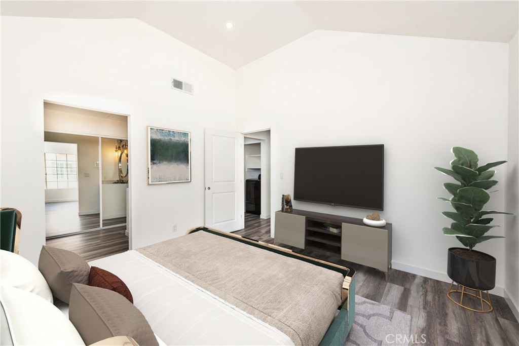 4240 Lost Hills Road, Unit 3108 Calabasas, CA 91301 - Photo 3 of 28 a bedroom with a bed and a flat screen tv