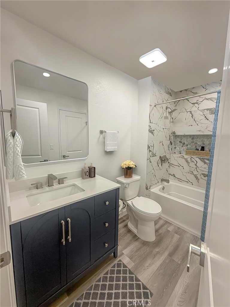 4240 Lost Hills Road, Unit 3108 Calabasas, CA 91301 - Photo 4 of 28 a bathroom with a sink a toilet and shower