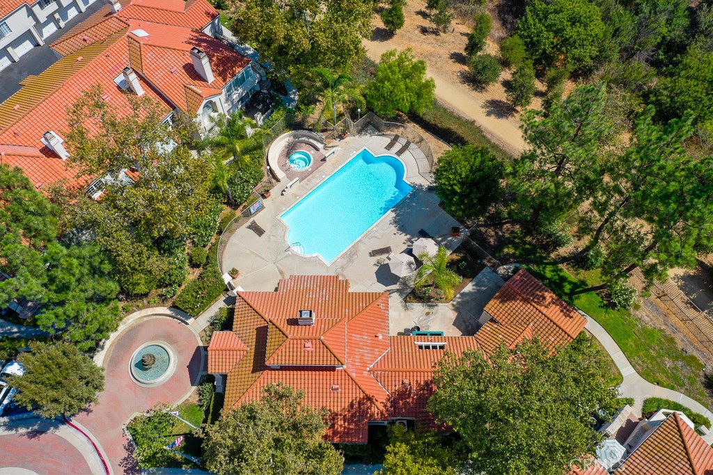 4240 Lost Hills Road, Unit 3108 Calabasas, CA 91301 - Photo 6 of 28 an aerial view of a house with a swimming pool a yard and a outdoor seating
