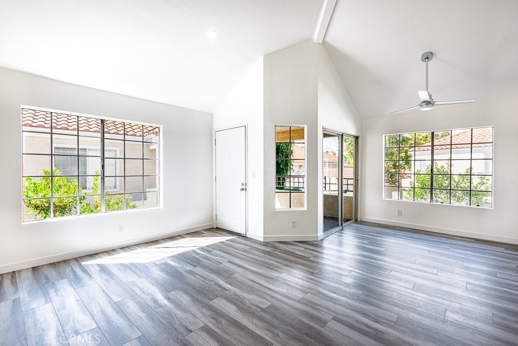 4240 Lost Hills Road, Unit 3108 Calabasas, CA 91301 - Photo 8 of 28 a view of an empty room with wooden floor and a window