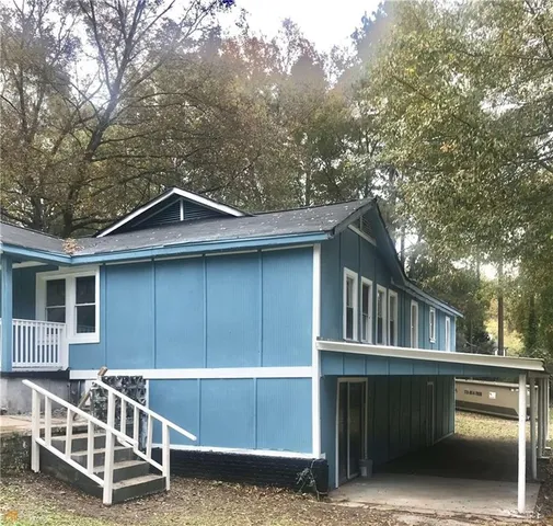 a front view of a house with balcony