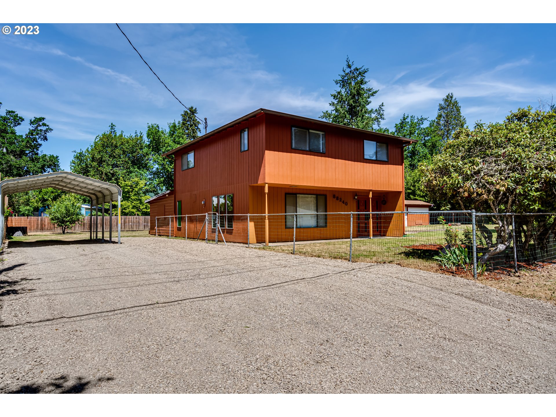 88240 Millican Road Springfield, OR 97478 - Photo 13 of 15 a front view of a house with a yard