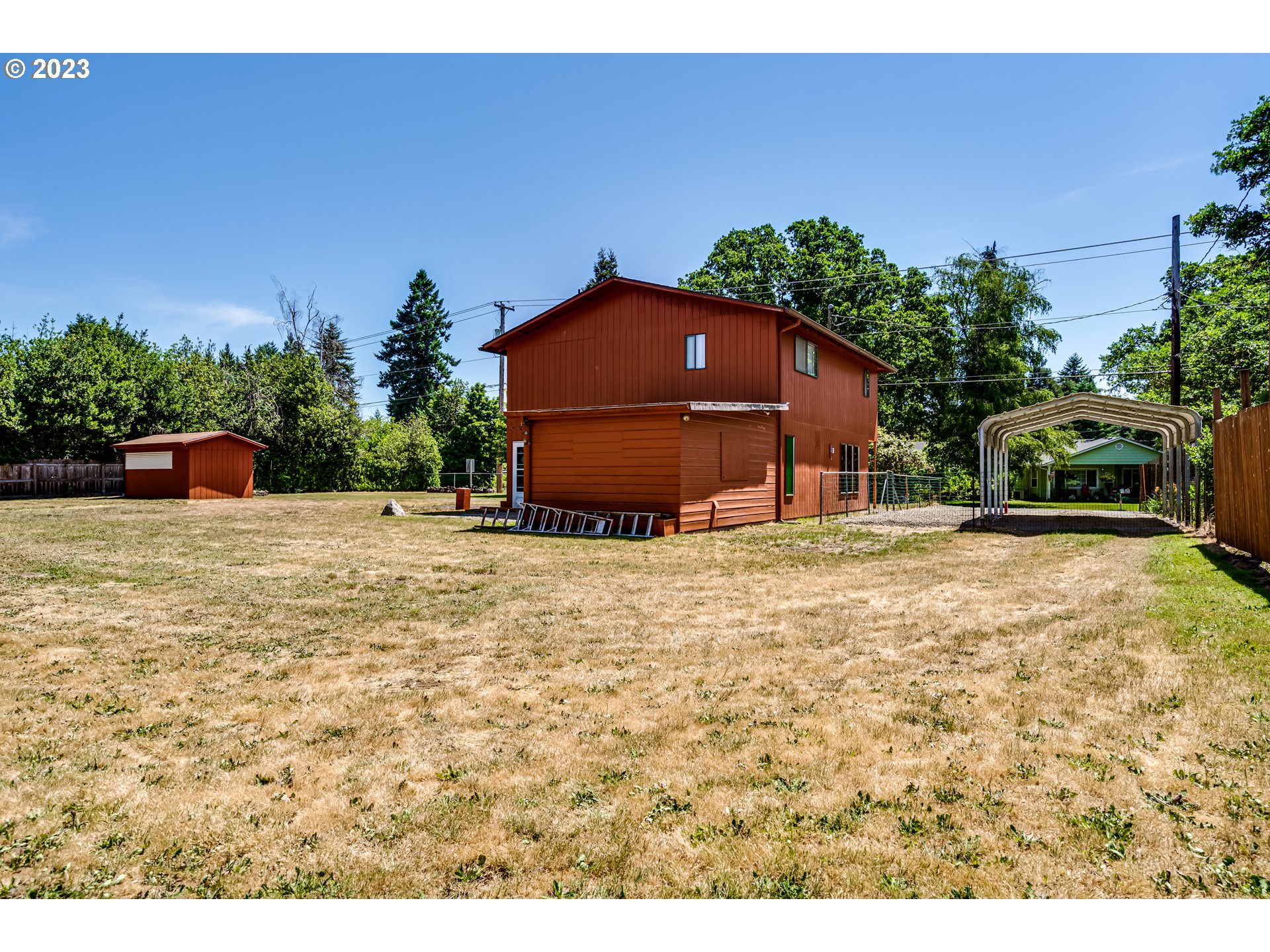 88240 Millican Road Springfield, OR 97478 - Photo 14 of 15 a backyard of a house with lots of green space